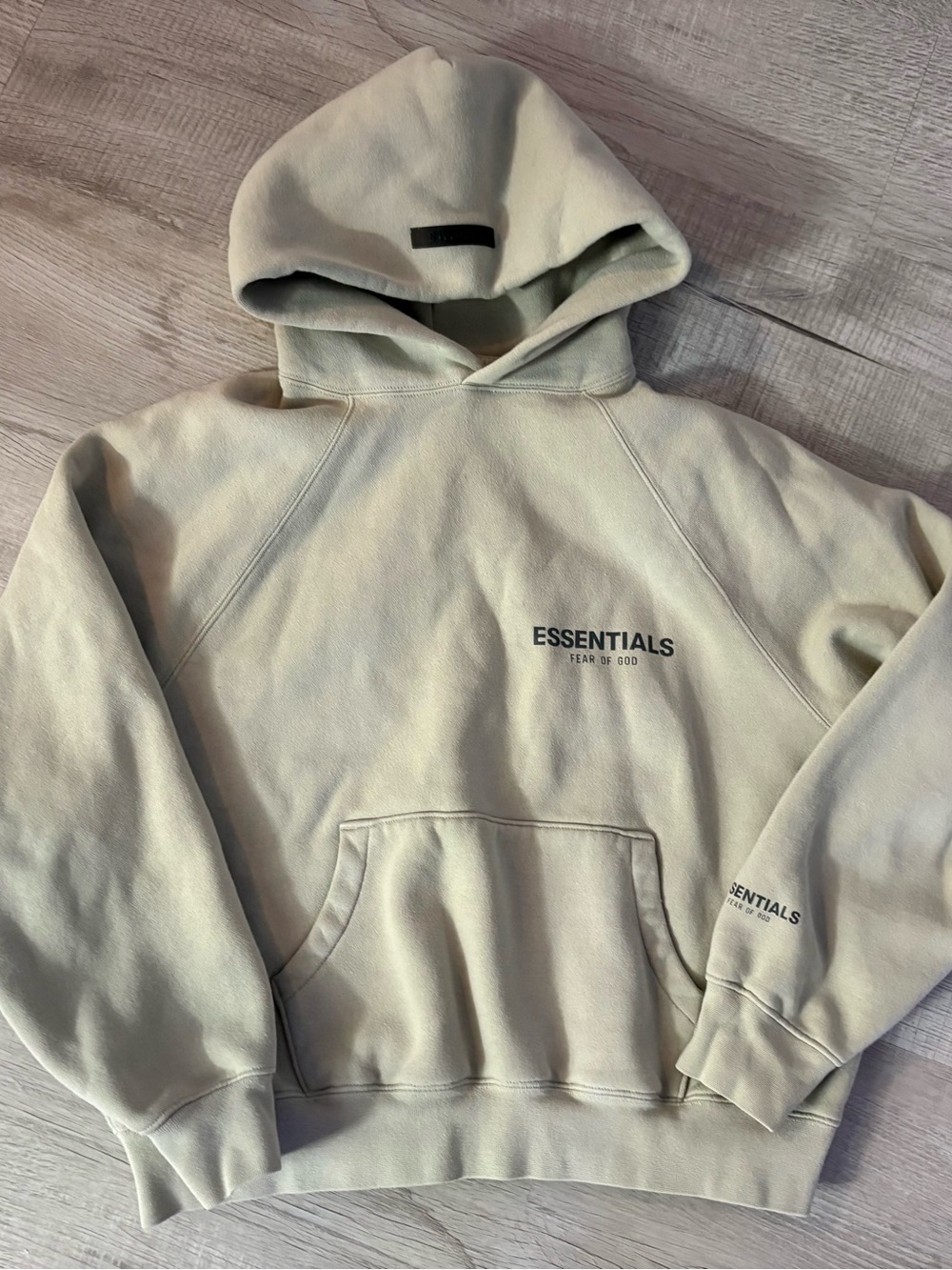 Fear of God Essentials Mint Green Hoodie with Black Logo